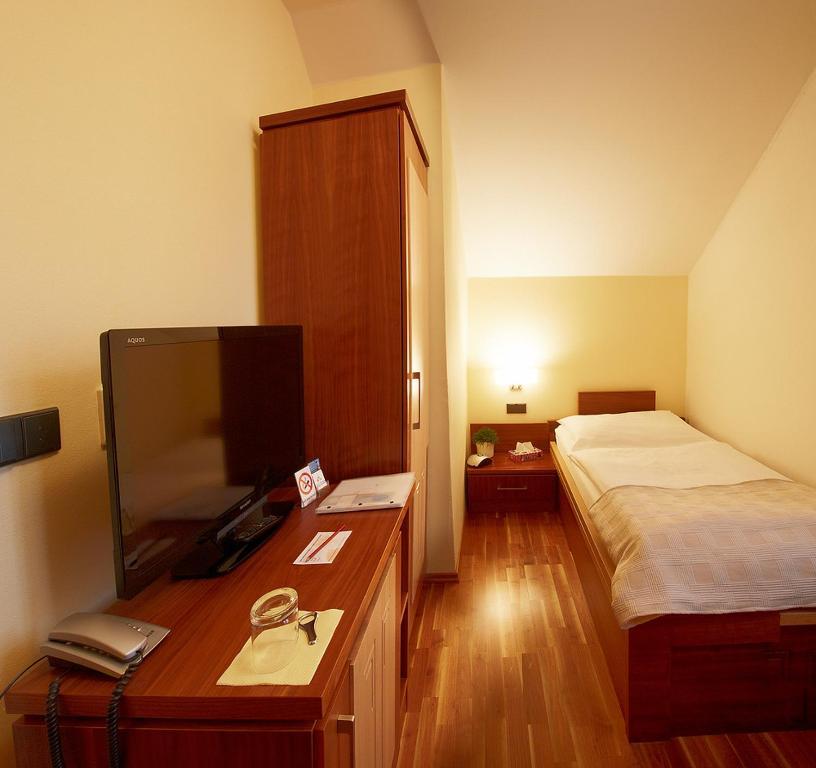 Hotel Penzion Na Hrade Оломоуц Стая снимка