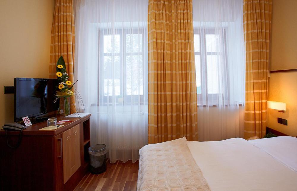 Hotel Penzion Na Hrade Оломоуц Стая снимка